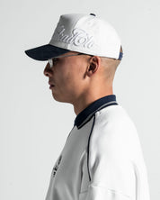 Trucker Cap Blanca con Azul